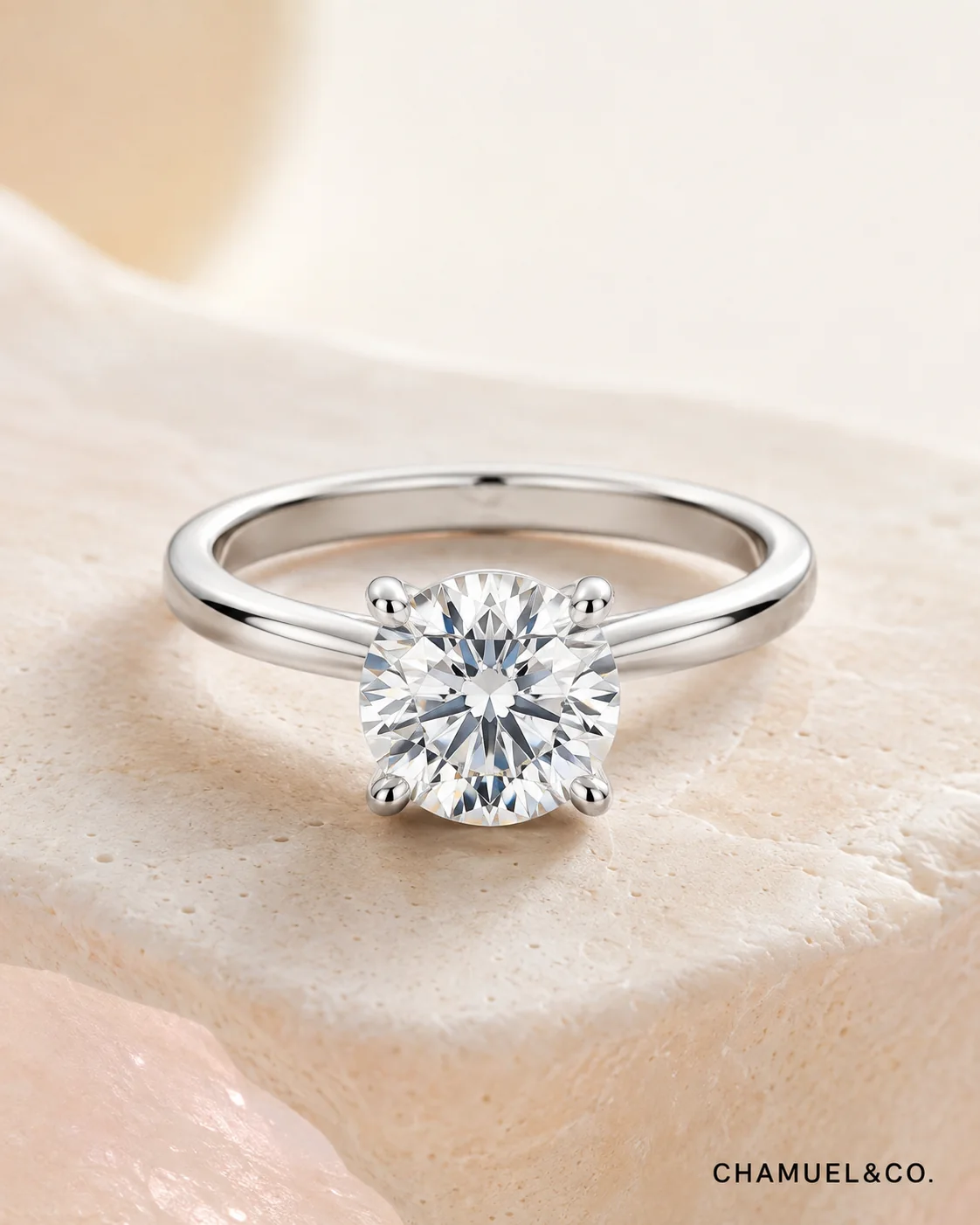 Four prong solitaire ring setting