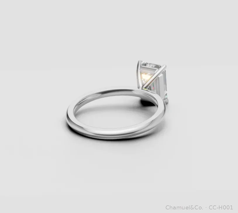 Emerald cut Heritage solitaire back view in white gold