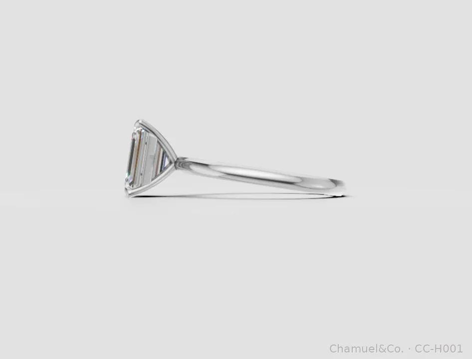 Emerald cut Heritage solitaire side view in white gold