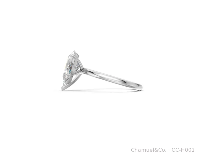 Pear shape Heritage solitaire side view in white gold
